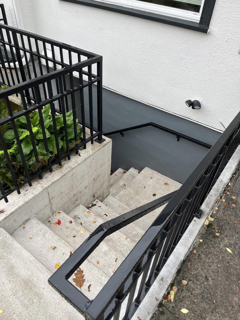 Stairwell leading to basement on outside of house in Portland Oregon